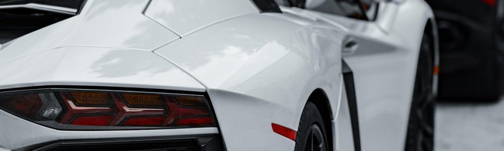 cars, super cars, luxury cars, lamborghini, corvette, black car, white car, sports cars, exotic cars, daytime, parked cars, car row, black lamborghini, white lamborghini, black corvette, high-end vehicles, automobile, car collection, outdoor